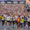 Large crowd of people running marathon
