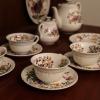 a set of fine china sitting on a table